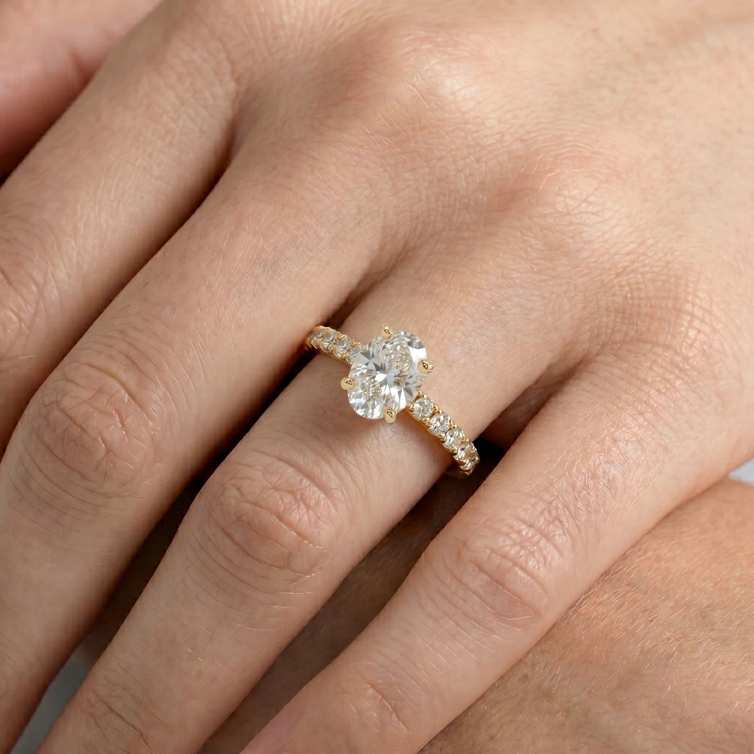 Oval Cut Diamond Solitaire Accent Ring
