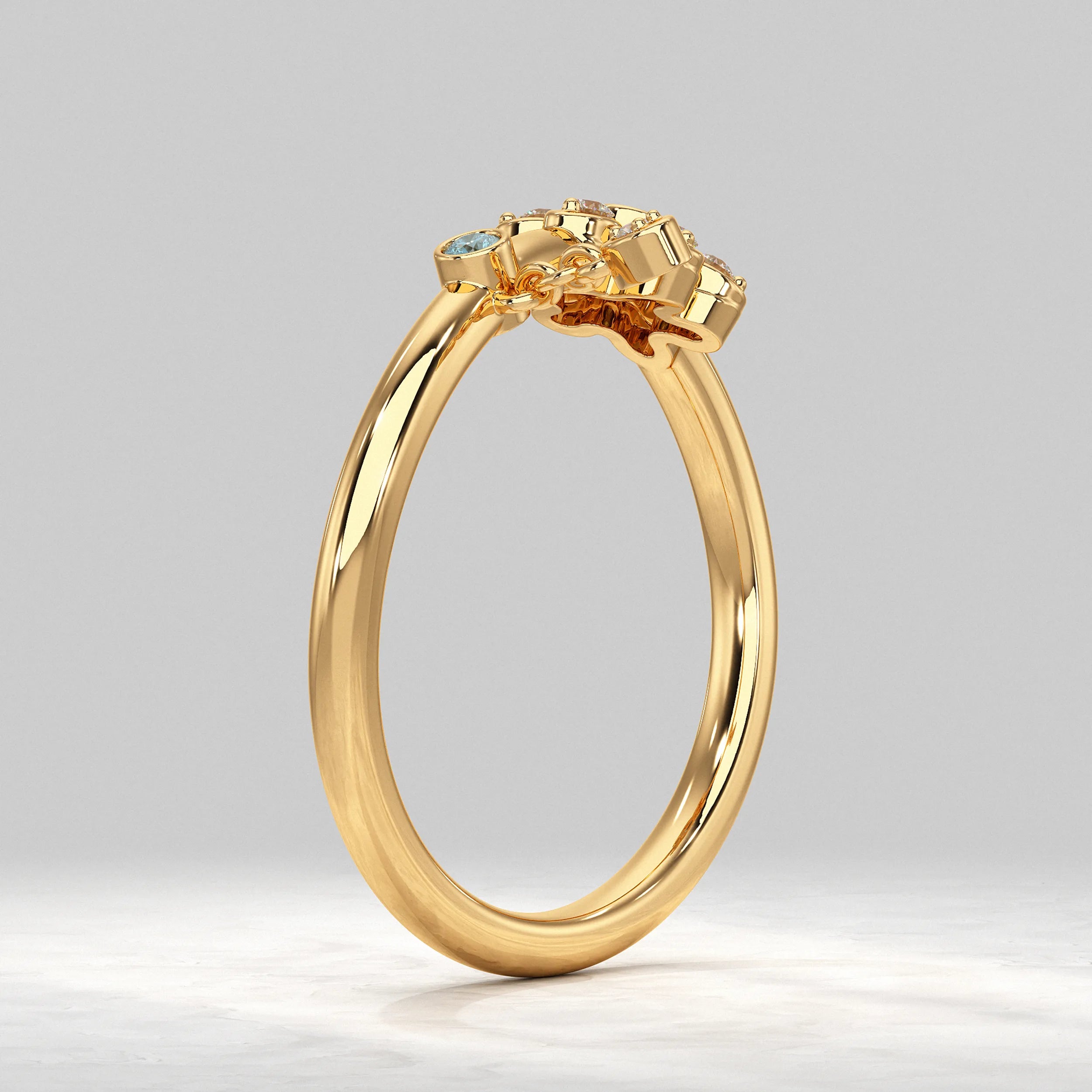 Delicate-Floral-Ring-In-Yellow-Gold-With-Blue-Stones-And-Hanging-Drop-Charm