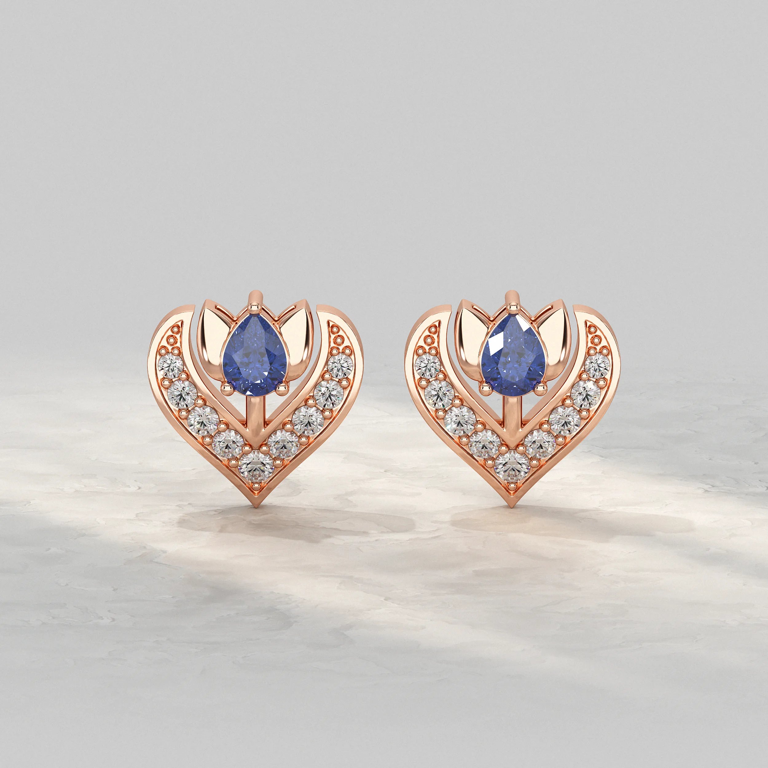 Rose-Gold-Earrings-With-Pear-Shaped-Blue-Stone-and-Diamond-Accent