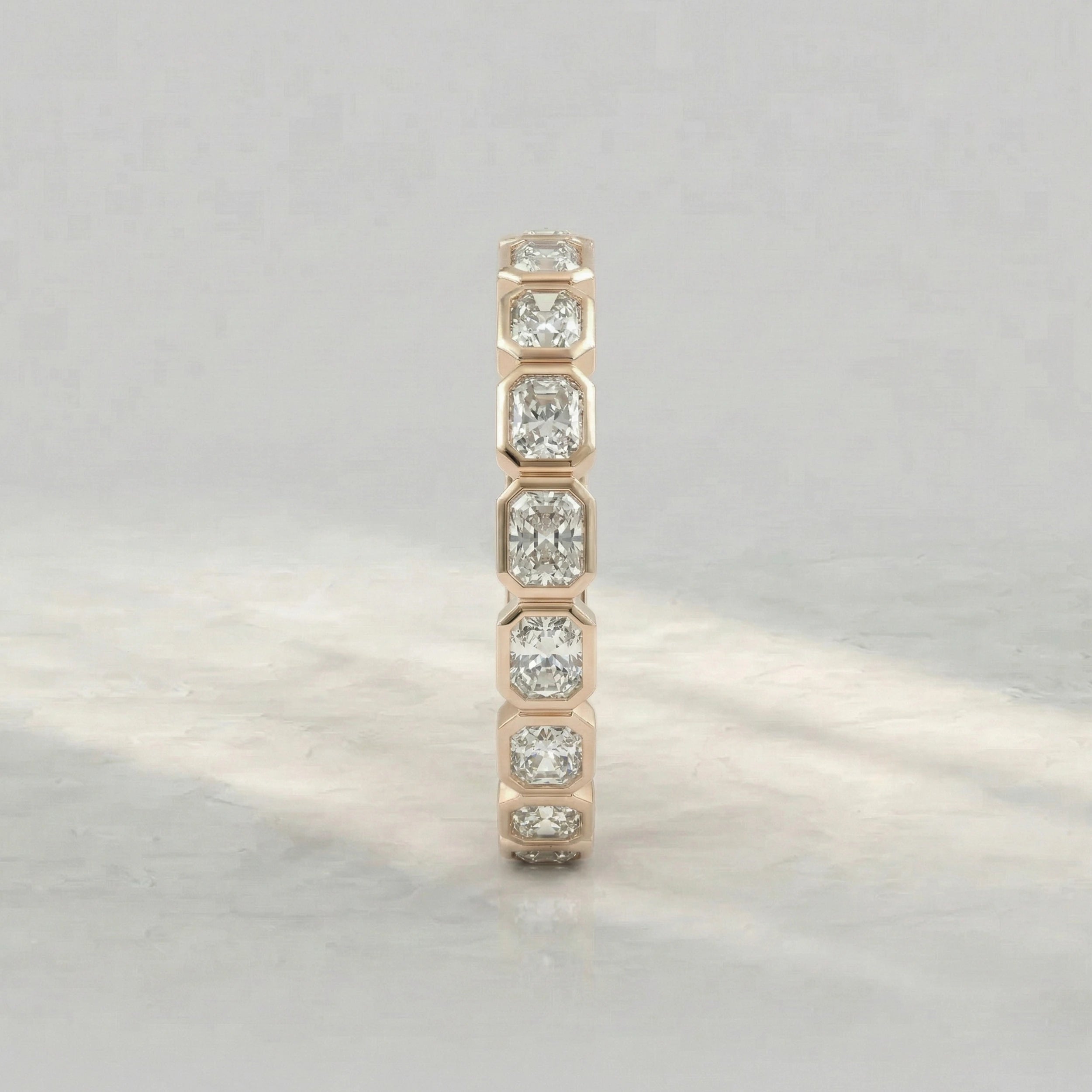 Bezel Set Radiant Cut Eternity Wedding Band