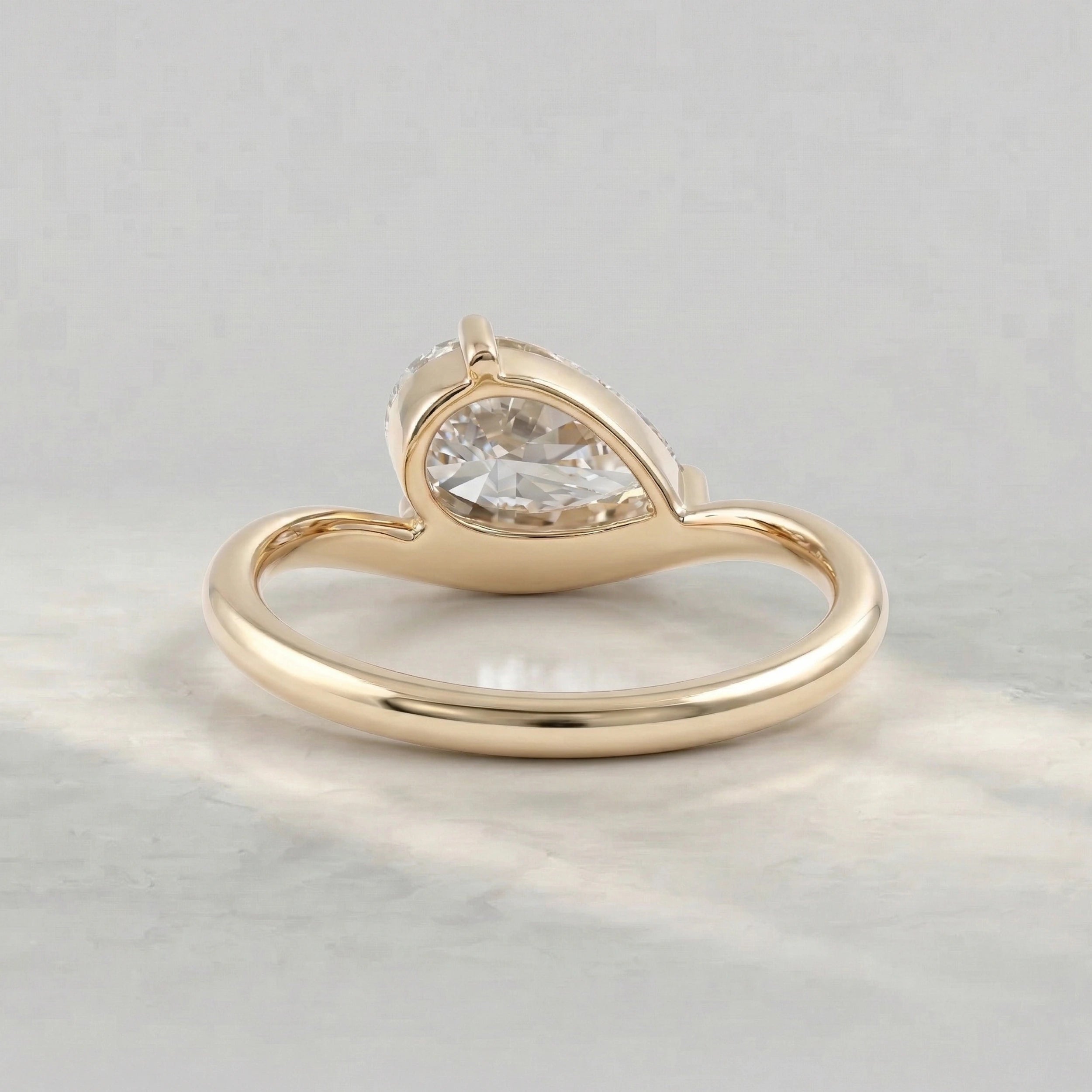 Pear Cut Diamond Solitaire Curved Engagement Ring Rings