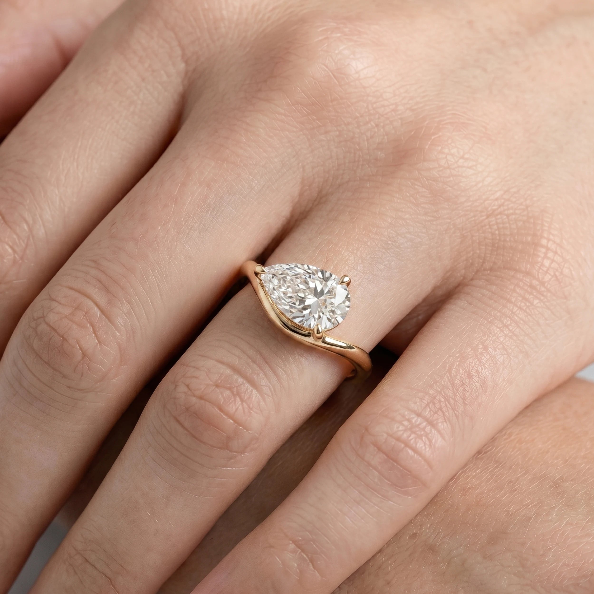 Pear Cut Diamond Solitaire Curved Engagement Ring Rings