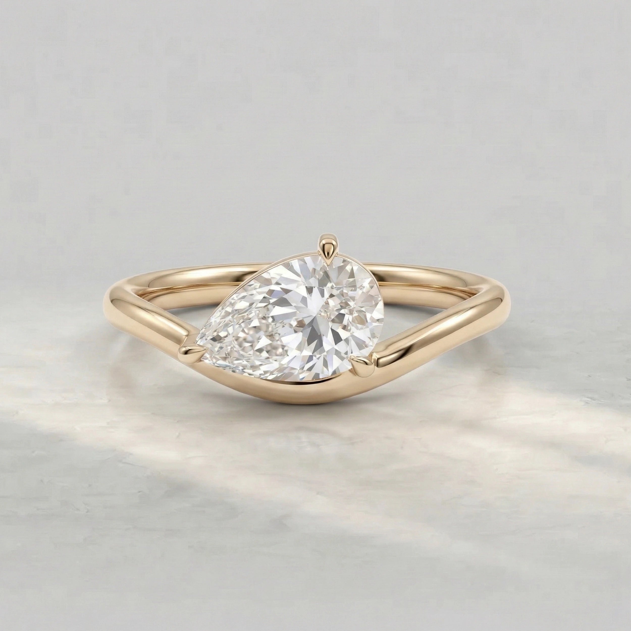 Pear Cut Diamond Solitaire Curved Engagement Ring Rings
